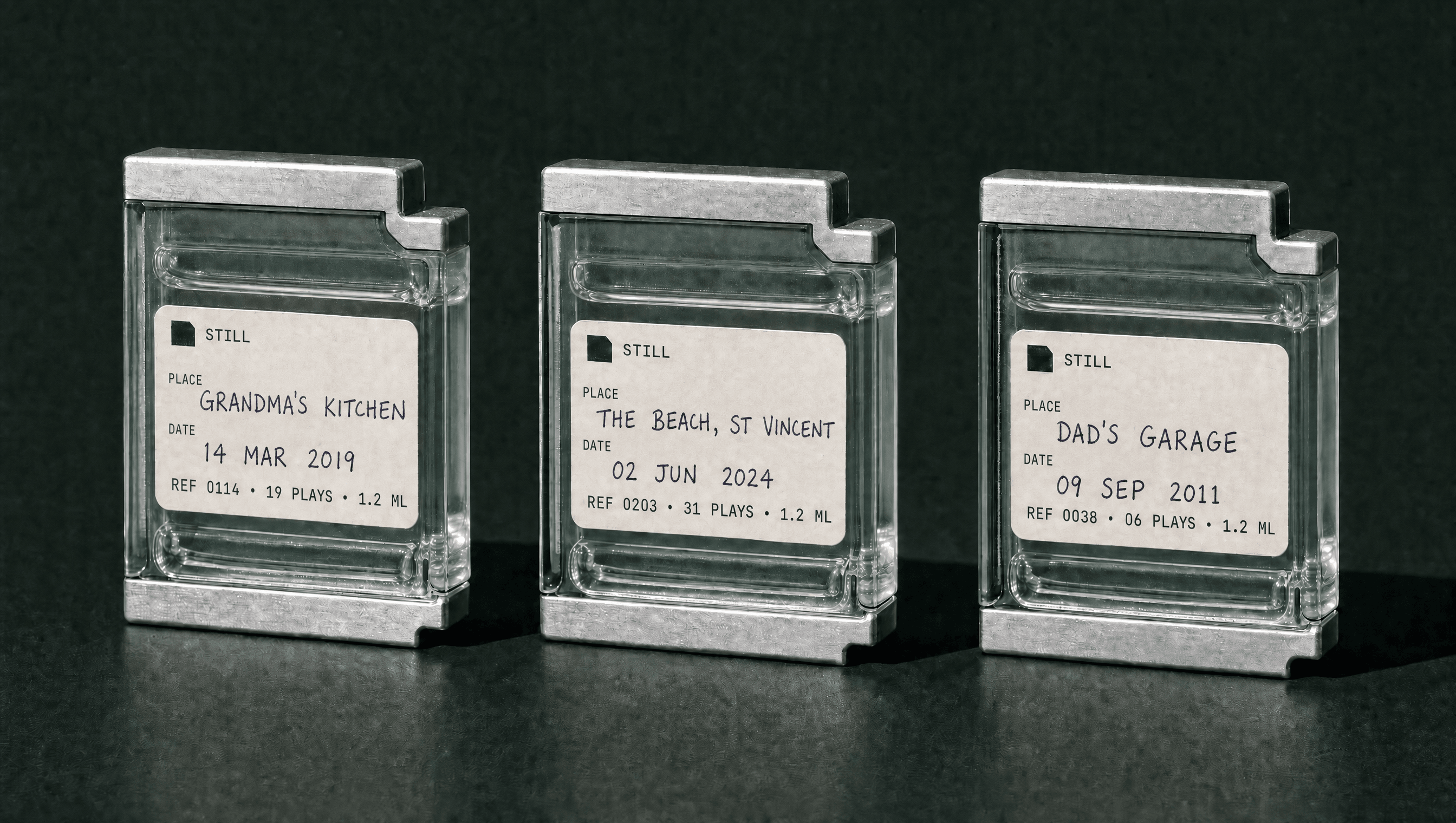 Three Still cartridges, each labelled with a place and a date